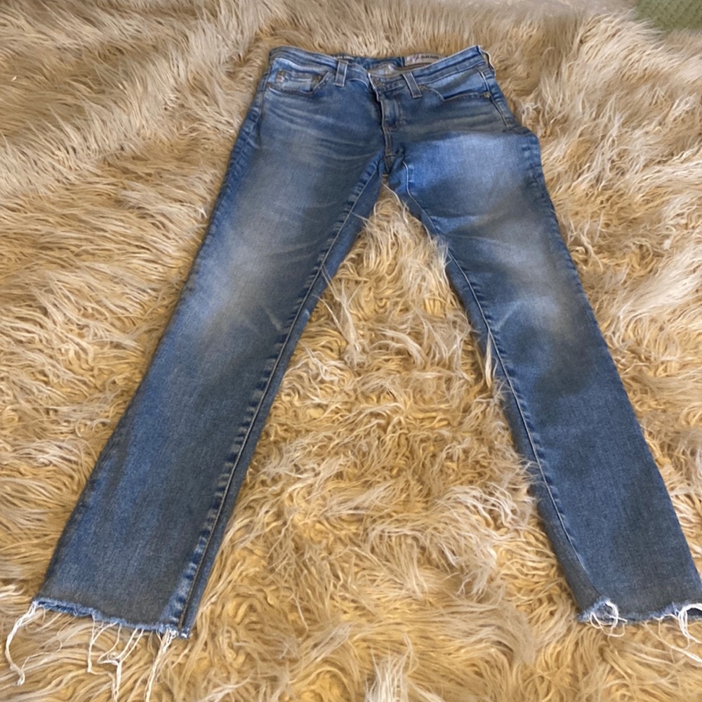 AG ankle aged denim ripped bottom jeans size 24R.